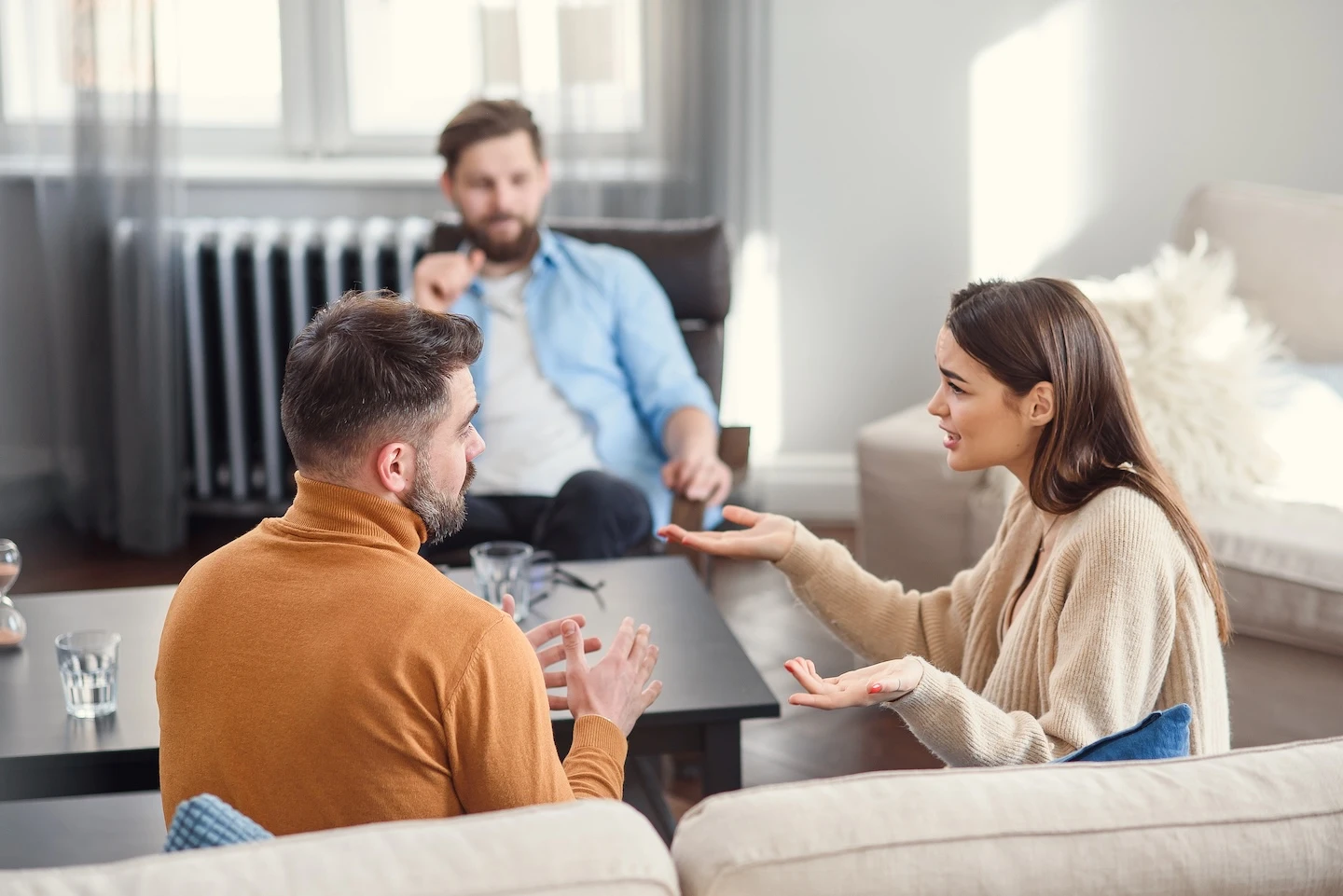 Attachment Styles and Relationship Patterns: A Christian Perspective 2 Couple talking through issues in couples therapy.