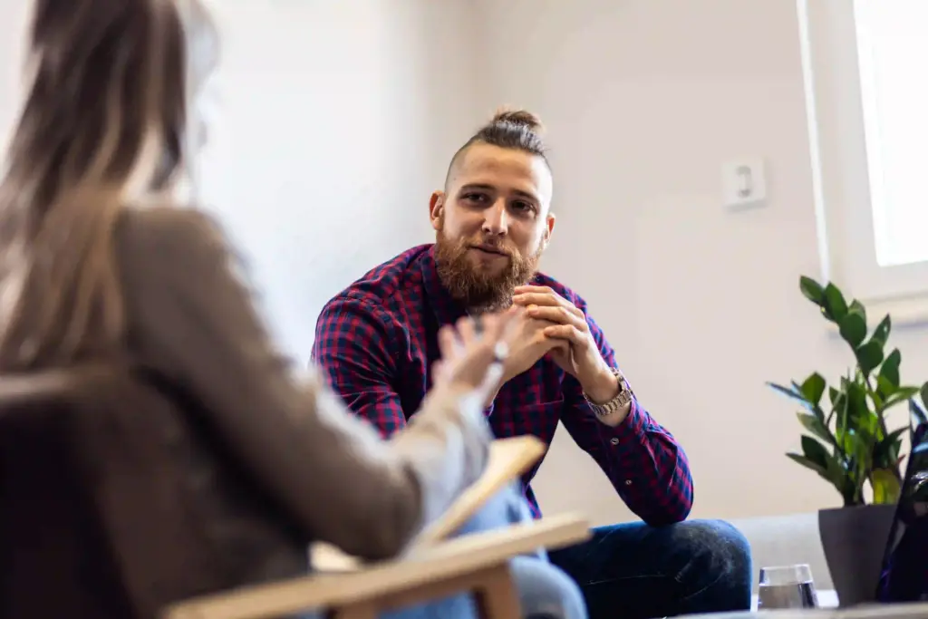 Anxiety Therapy in Austin: Managing Anxiety as a Spiritual Practice 1 Man talking with a therapist during a counseling session